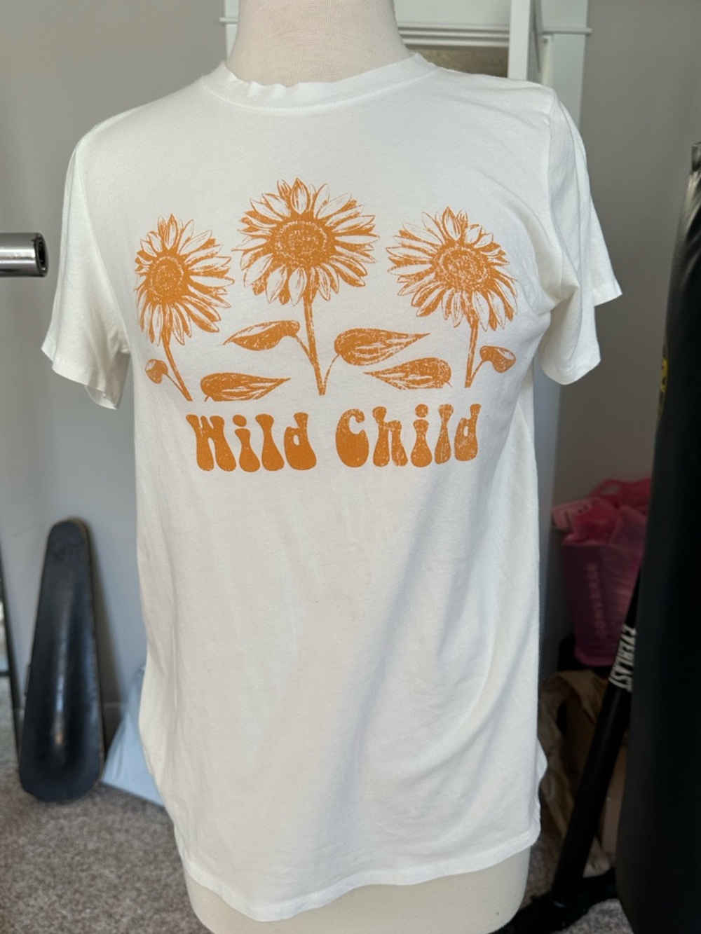 Wild Child Sunflower Graphic TeeWhite & yellow. Med. women’s. Stretchy and soft